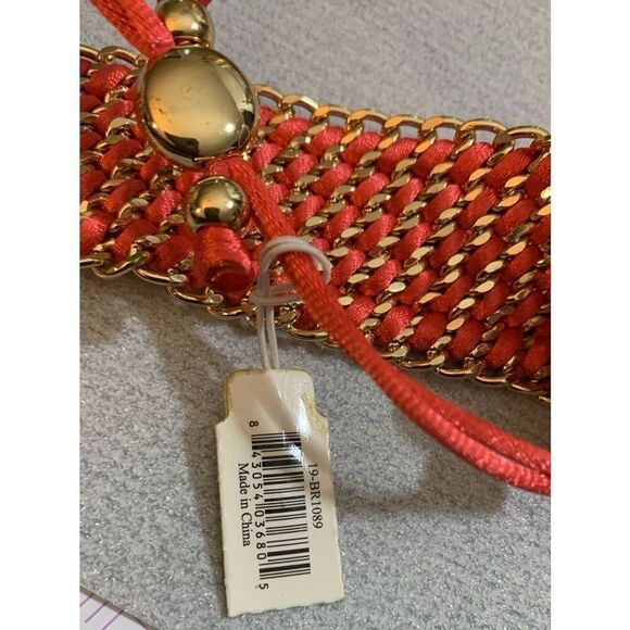 Lovita rhinestone encrusted salmon color bracelet expands 12in retracts 6in - Picture 6 of 6